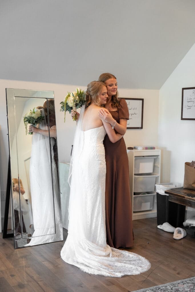 bride and bridesmaid waiting to walk down the aisle at a Central Texas wedding ceremony