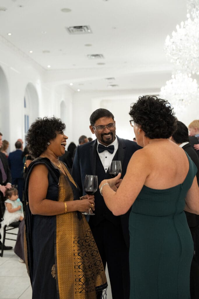 Guests mingle at Cocktail hour at Chateau Nouvelle wedding