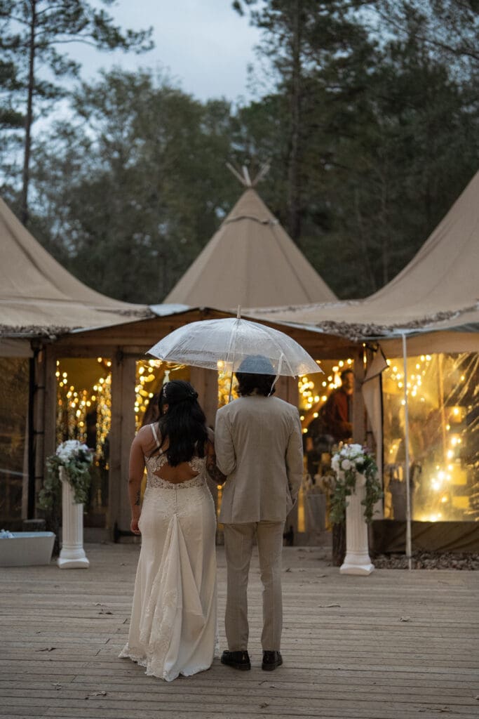 newlywed couple entering houston wedding venue for their reception