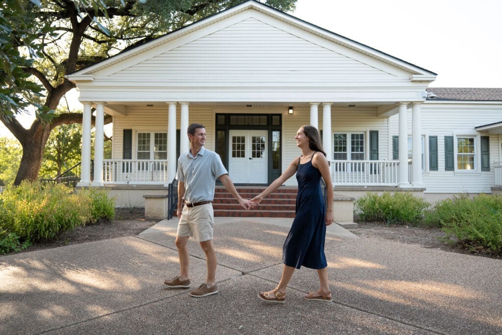 couple walks at cameron park for engagement session